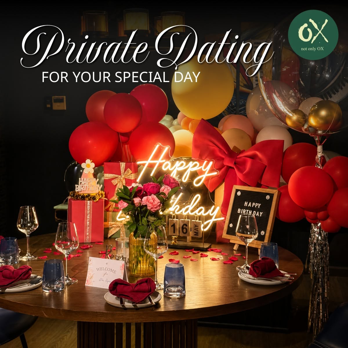 A decorated intimate table with red roses, balloons and private-dating lettering